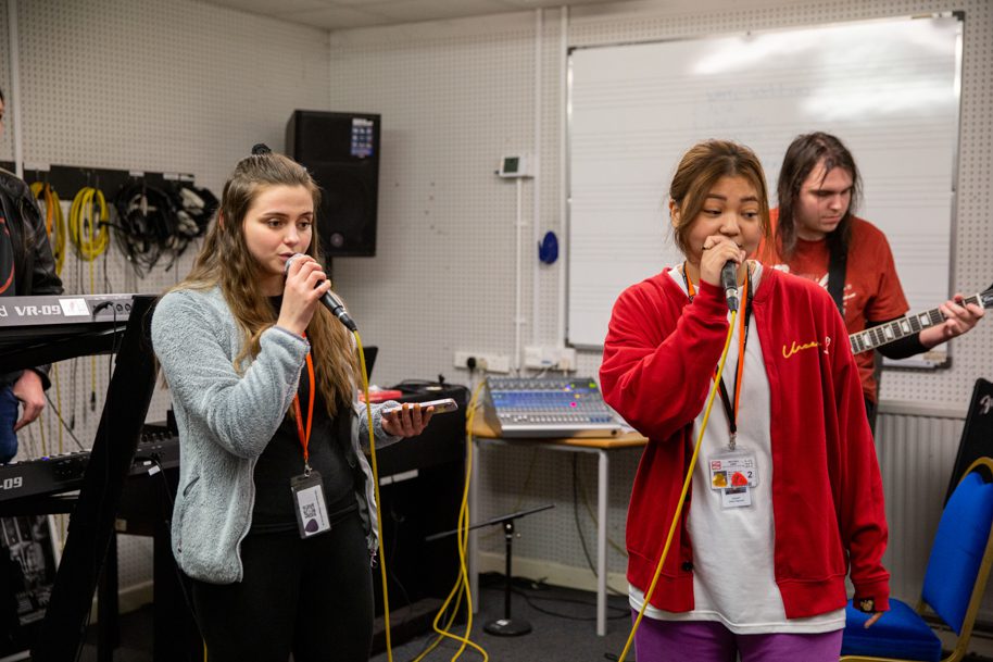 Two students singing